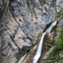 Savica waterfall, spurting from a karst cavern, the water falls in the shape of an A-lettered 2-meter waterfall 78 m deep. 